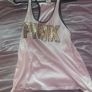 A white sparkly tank top